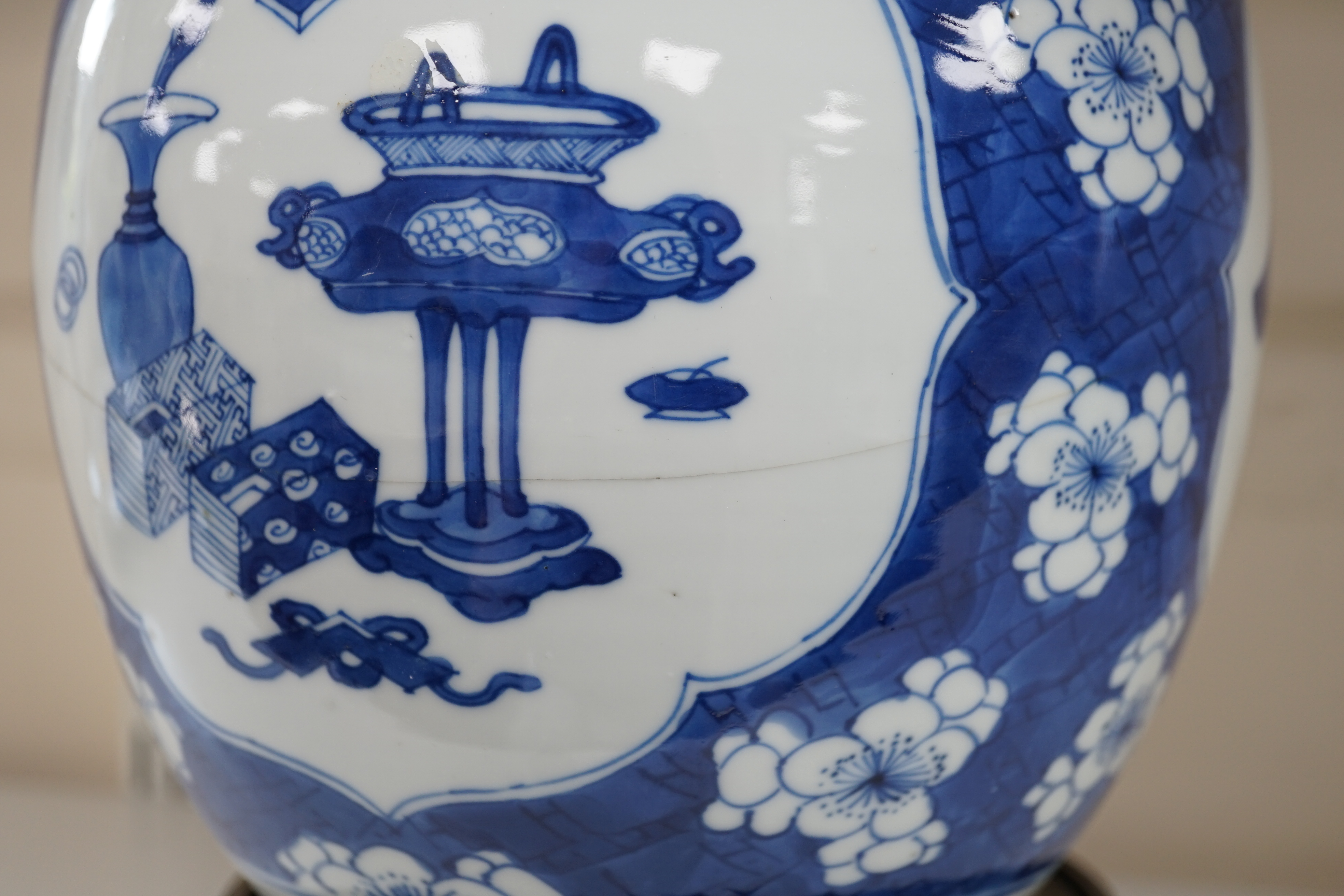 A Chinese blue and white ‘Antiques’ jar, Kangxi period, cracked